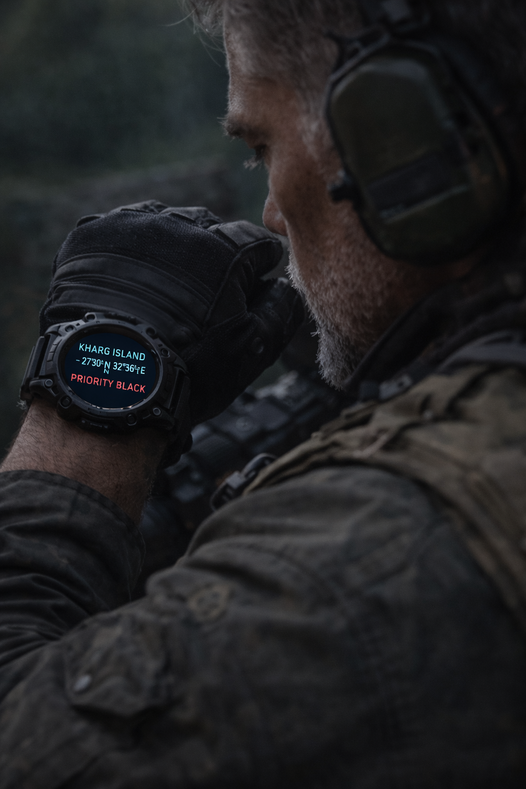 A matte-black stealth transport aircraft cutting silently through the upper atmosphere above the clouds.